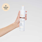 milk-shake-curl-passion-conditioner-in-hand
